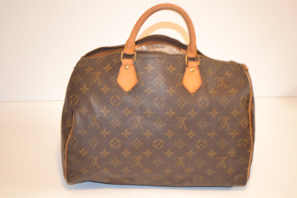 Authentic Louis Vuitton Monogram Speedy 35 Handbag (SALE - 77% OFF)